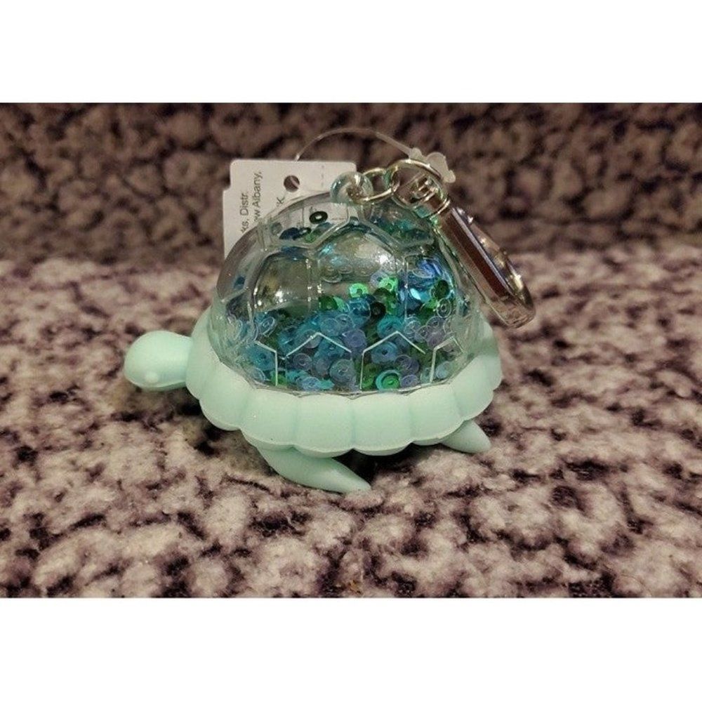 Bath & Body Works Green Irresedscent Sequin Turtle Pocketbac Holder